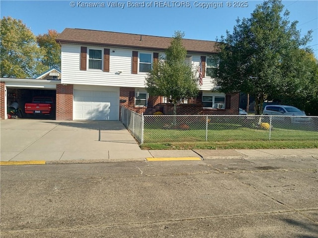 view of front of property featuring a garage and a front lawn