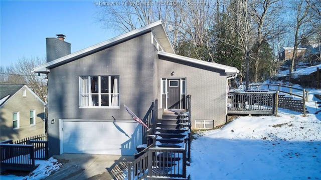 view of front of home with a garage