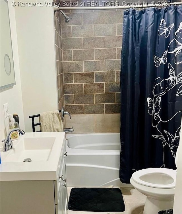 full bathroom featuring shower / bathtub combination with curtain, vanity, tile patterned floors, and toilet