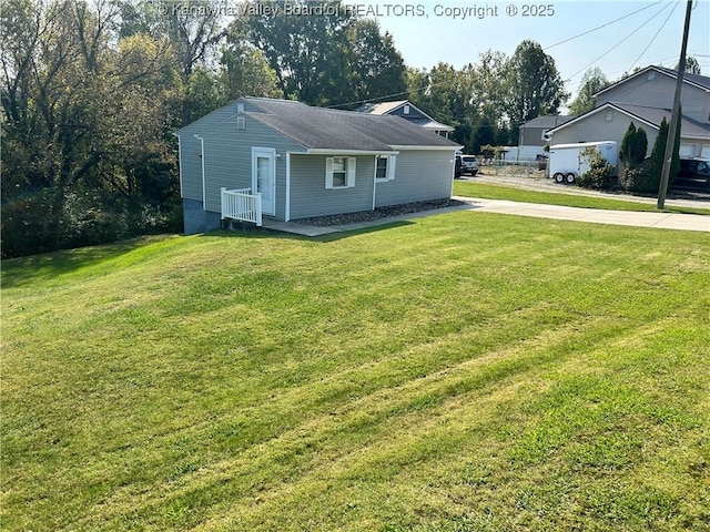 view of front of home with a front yard