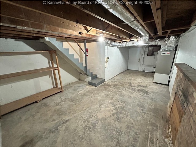 basement featuring heating unit