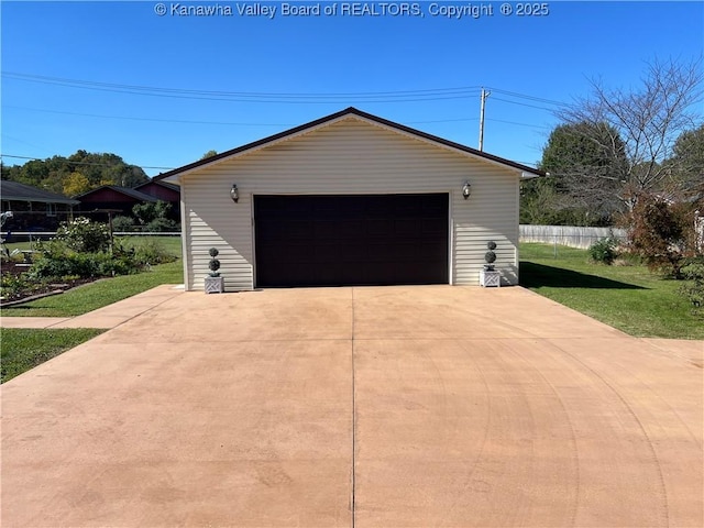 garage with a yard