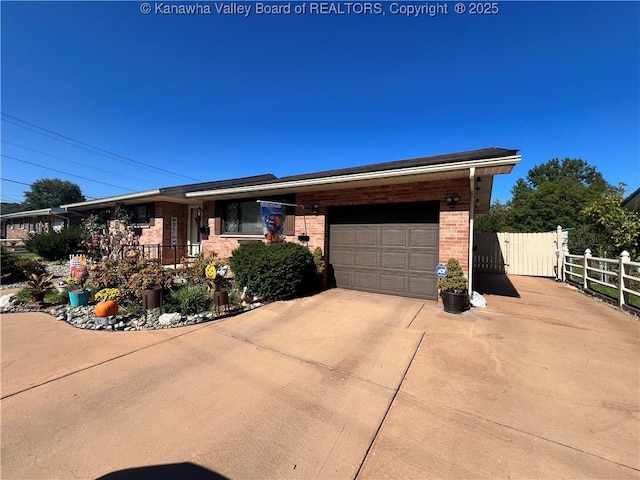 ranch-style home with a garage