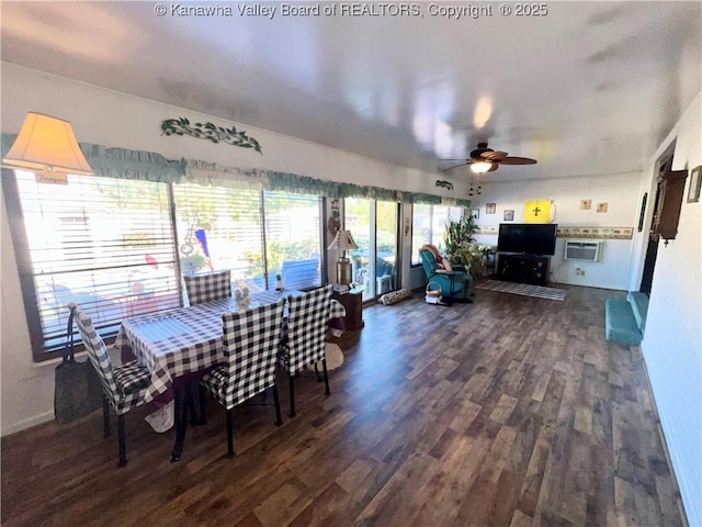 unfurnished dining area featuring a wall mounted air conditioner, dark wood-type flooring, and ceiling fan