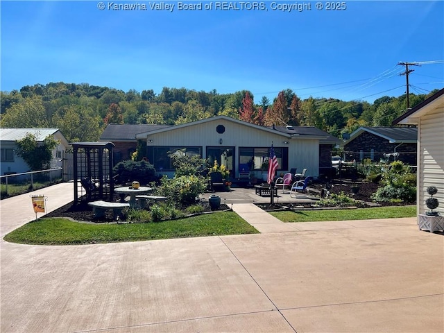 view of front of house with a patio