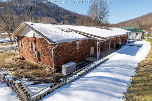 view of snow covered house