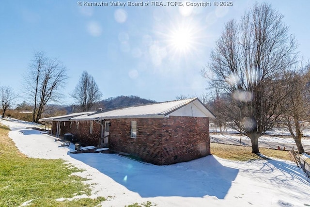 view of snow covered property