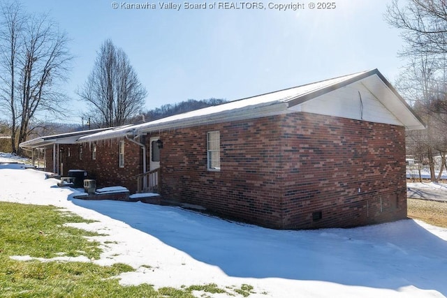 view of snow covered property