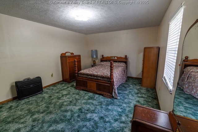 carpeted bedroom with a textured ceiling