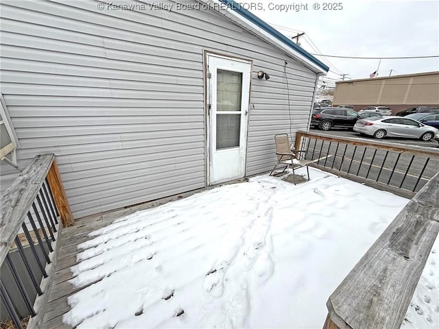 view of snow covered deck