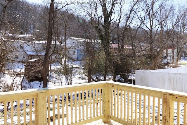 view of snow covered deck