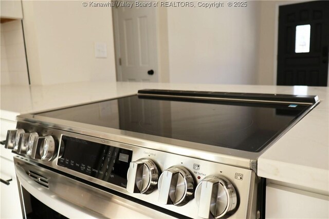 washroom with independent washer and dryer