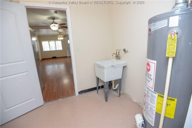 utility room with water heater