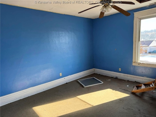 unfurnished room featuring ceiling fan