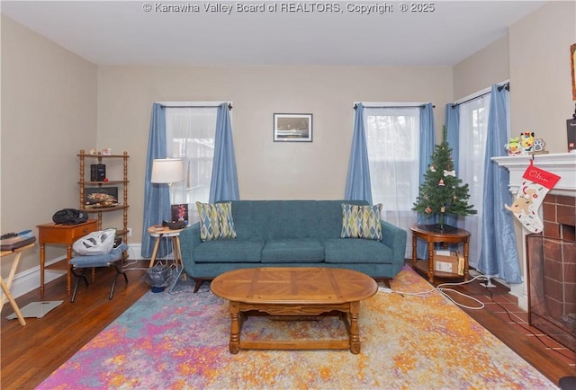 living room featuring dark wood-type flooring