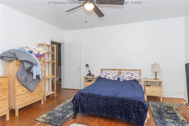 bedroom featuring ceiling fan and wood-type flooring