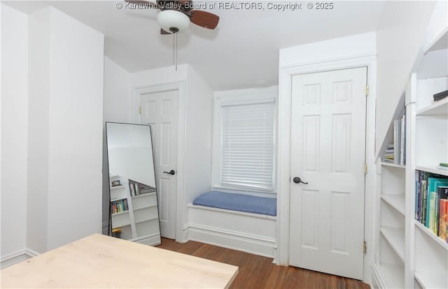 bedroom featuring dark hardwood / wood-style floors and ceiling fan