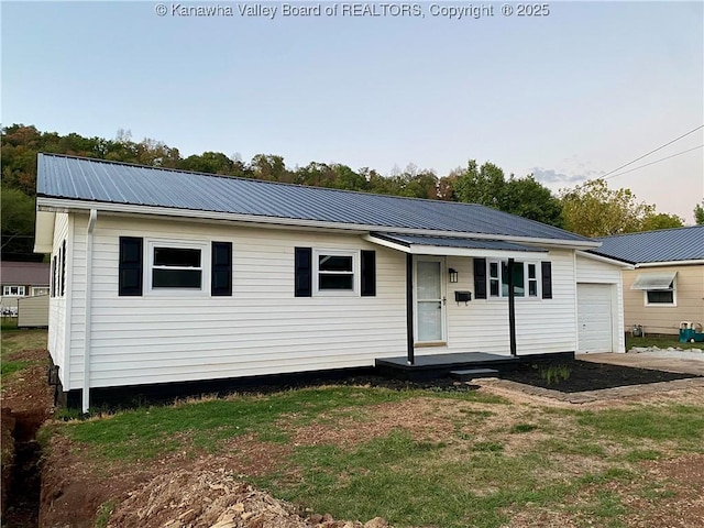 ranch-style home with a front lawn