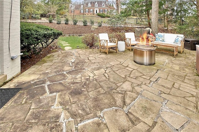 view of patio / terrace with a fire pit