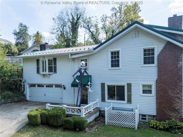 view of front of property with a garage