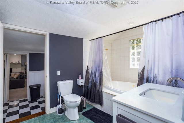 full bathroom with shower / bathtub combination with curtain, lofted ceiling, vanity, a textured ceiling, and toilet