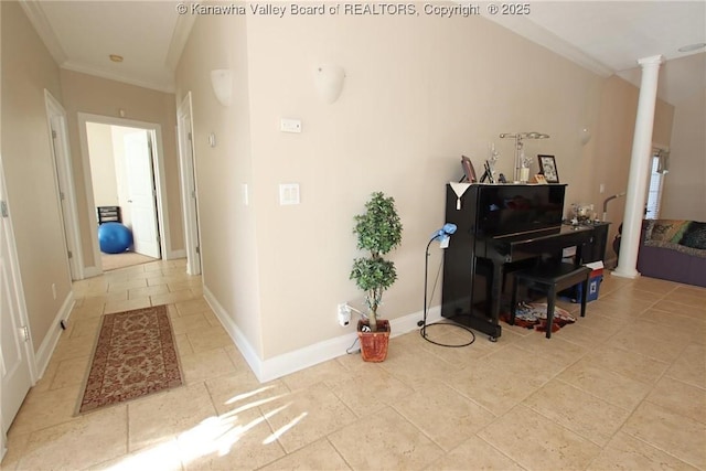 misc room featuring crown molding and ornate columns