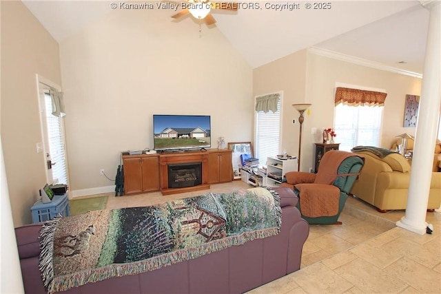 living room with decorative columns, ornamental molding, ceiling fan, and high vaulted ceiling