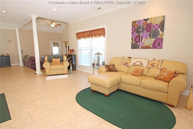 living room featuring ornate columns, crown molding, and ceiling fan