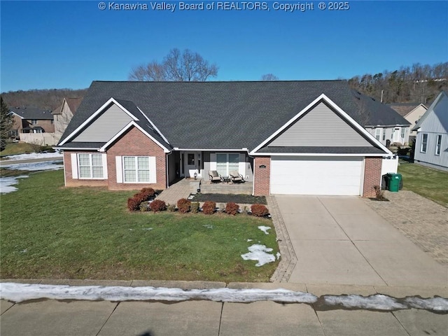 view of front facade with a garage and a front lawn