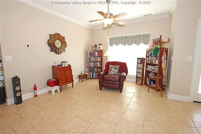 sitting room with crown molding and ceiling fan