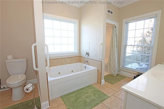 full bathroom featuring vanity, ornamental molding, plus walk in shower, tile patterned floors, and toilet