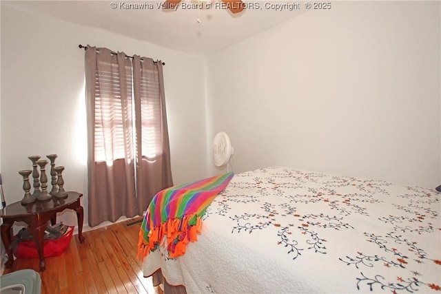 bedroom featuring hardwood / wood-style floors