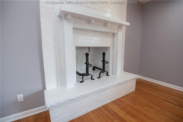 interior details featuring hardwood / wood-style floors