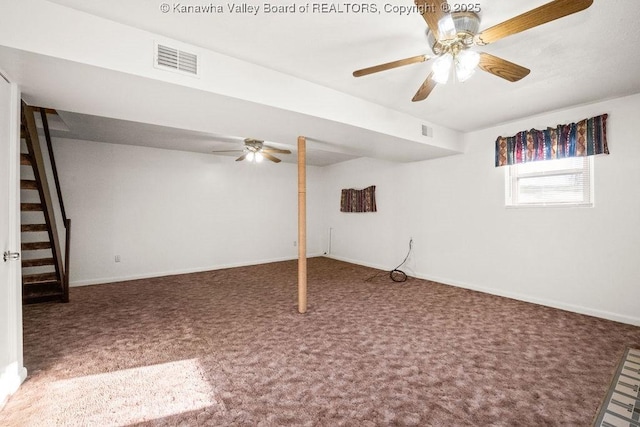 basement with carpet flooring and ceiling fan