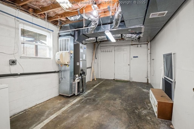 basement featuring heating unit