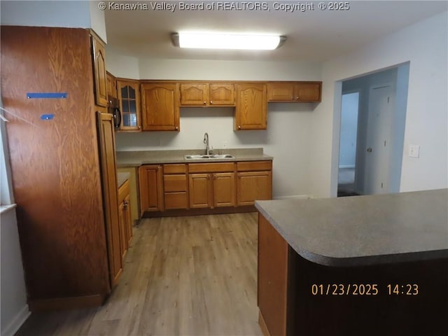 kitchen featuring sink and light hardwood / wood-style floors