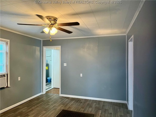 spare room with ceiling fan, ornamental molding, and dark hardwood / wood-style floors