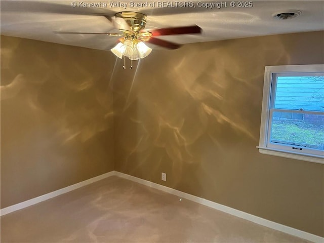 empty room featuring ceiling fan