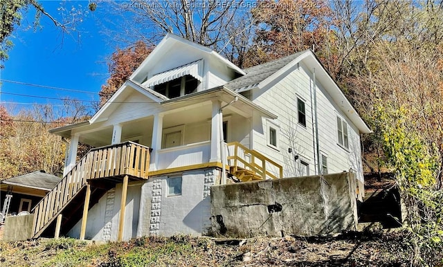 view of home's exterior with covered porch