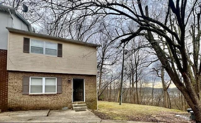 front of property with a patio