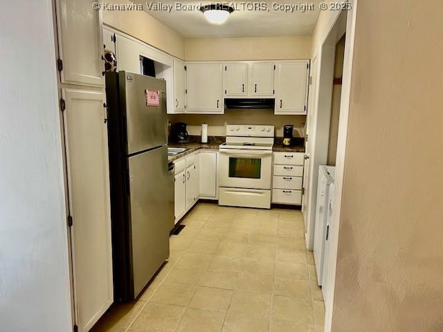 kitchen with white cabinets, stainless steel fridge, exhaust hood, and white range with electric stovetop