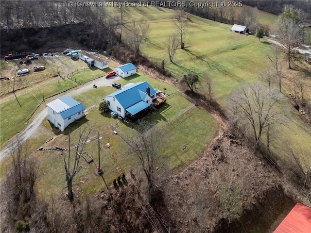 birds eye view of property featuring a rural view