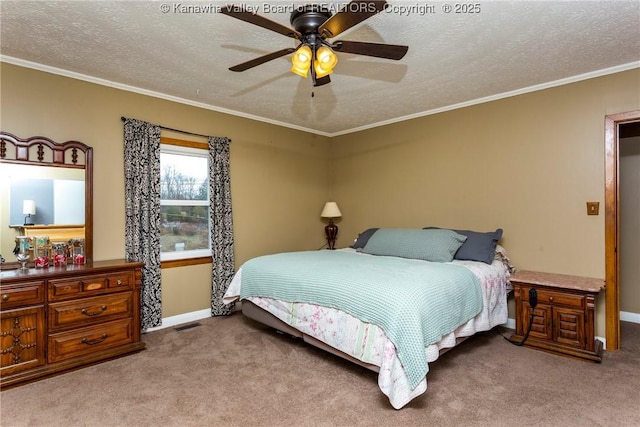 carpeted bedroom featuring ceiling fan, ornamental molding, and a textured ceiling