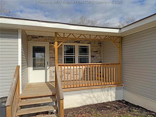 property entrance featuring covered porch