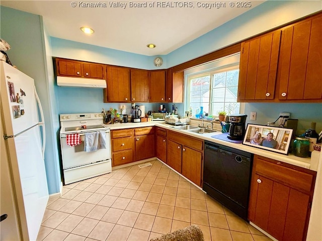 kitchen with sink, white appliances, and light tile patterned flooring