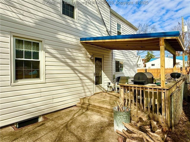 view of patio / terrace featuring grilling area and a deck