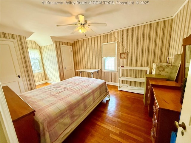 bedroom with dark wood-type flooring