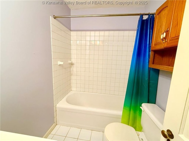 bathroom featuring shower / tub combo, tile patterned floors, and toilet