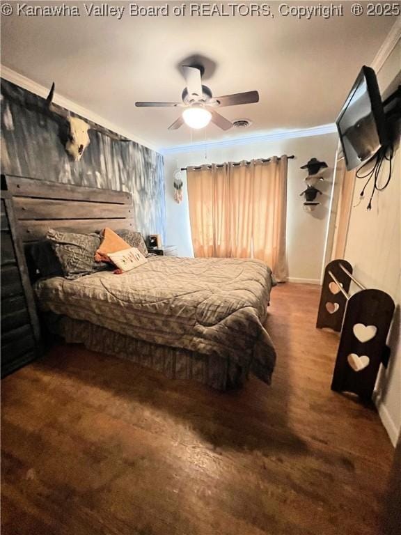 bedroom with crown molding, ceiling fan, and dark hardwood / wood-style floors