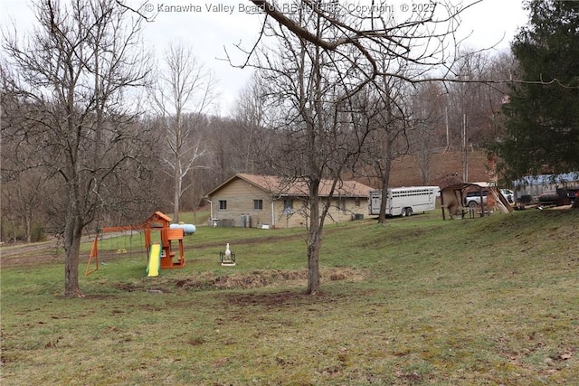 view of yard with a playground